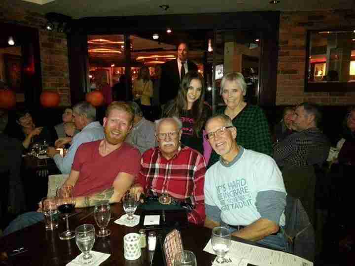 A crew of FAP advocates gathers at a conference for dinner